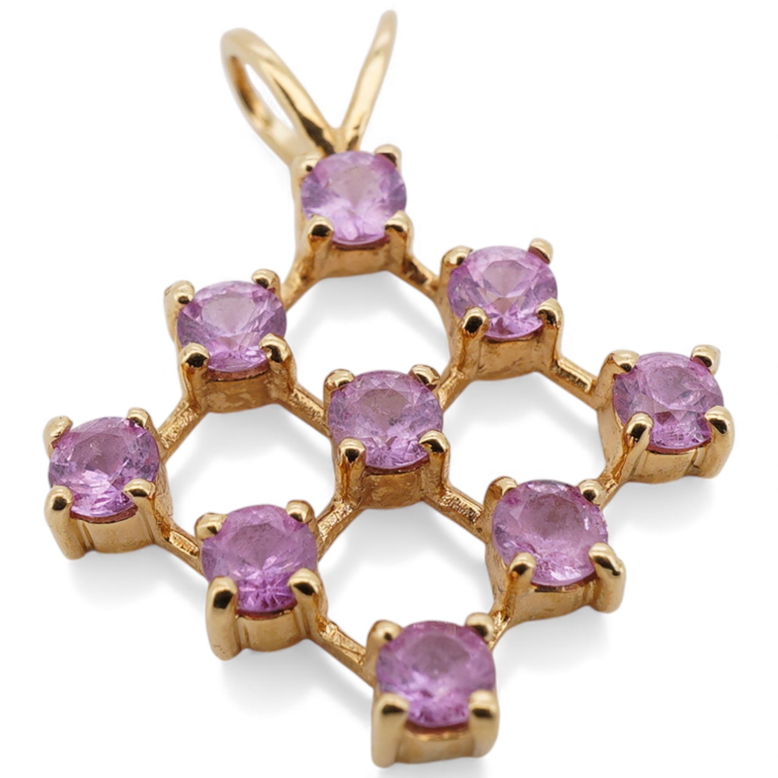 A recent 18ct gold and nine stone pink sapphire set diamond shaped pendant, overall 23mm, gross weight 2.6 grams.